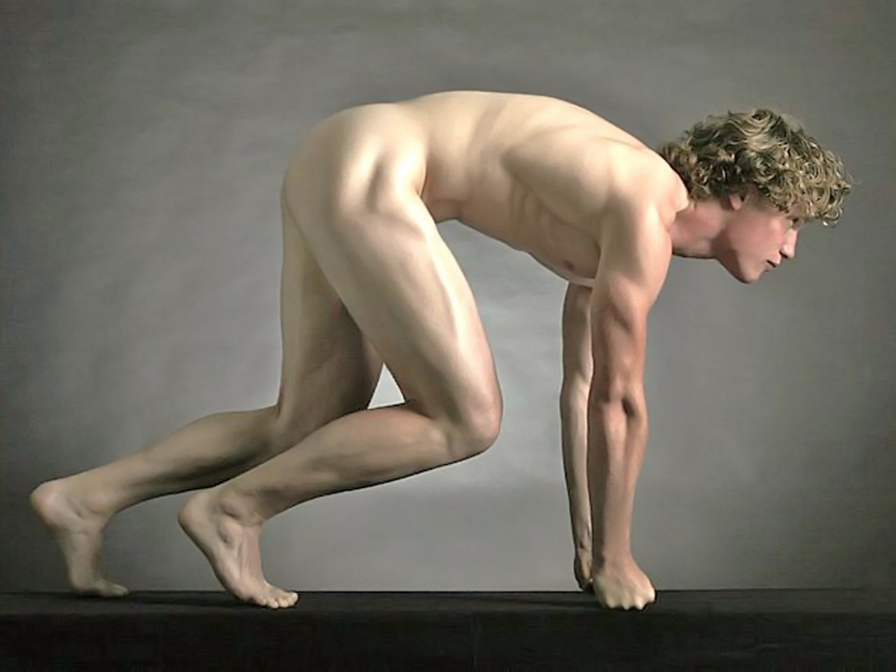 Naked male posing